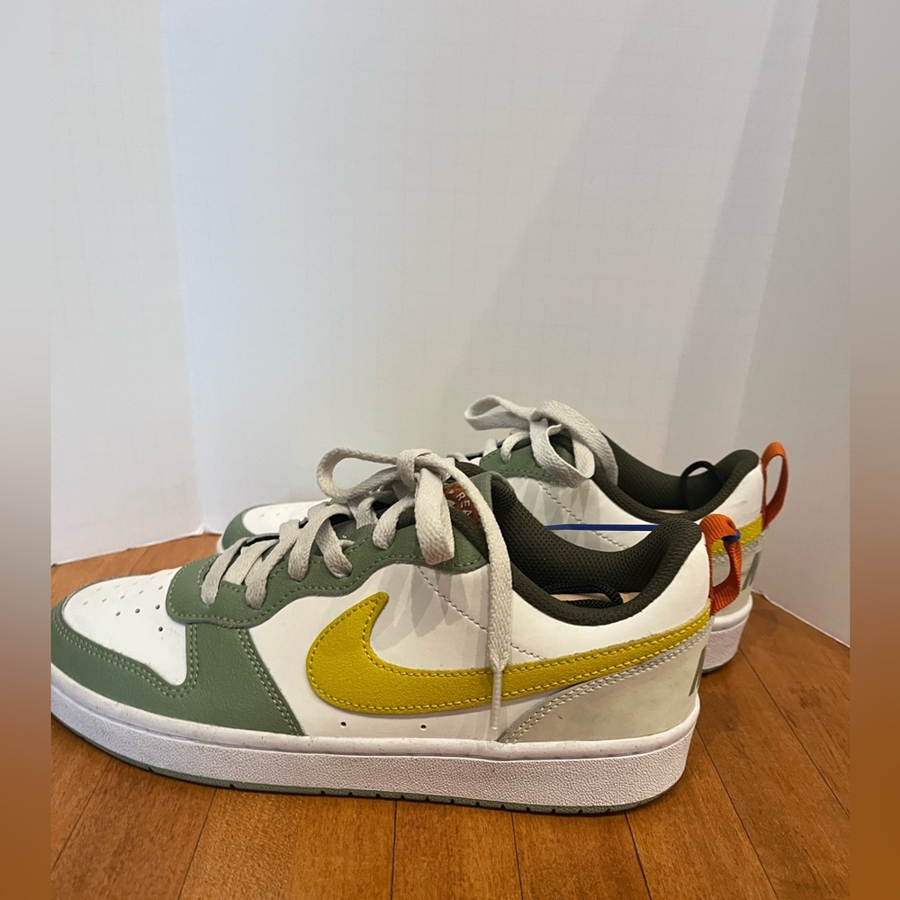 Nike Court Borough Low 2 SE (GS) in the "White Yellow Strike" colorway.